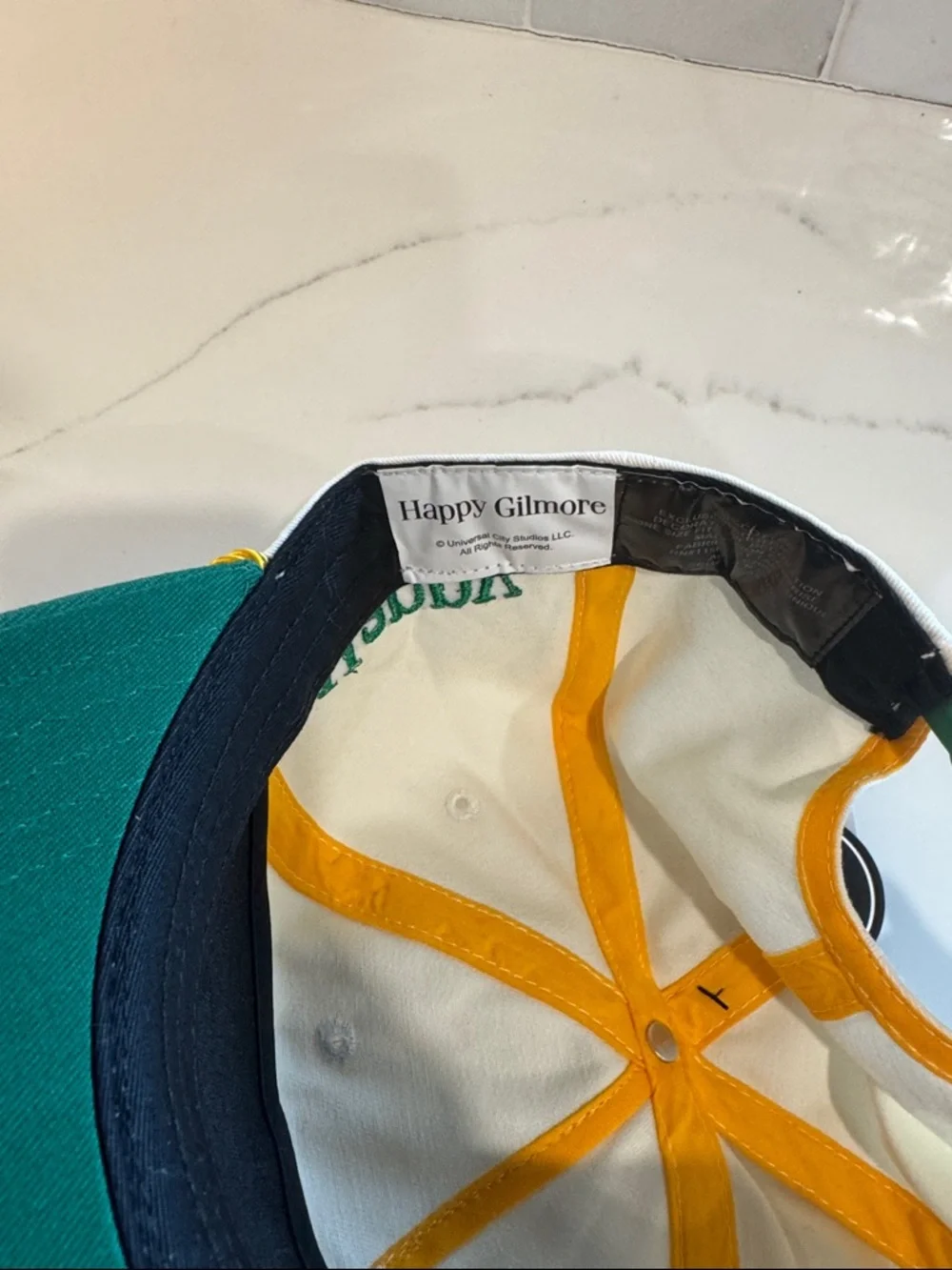 BIOWORLD Happy Gilmore Country Club Adjustable White & Green Cap